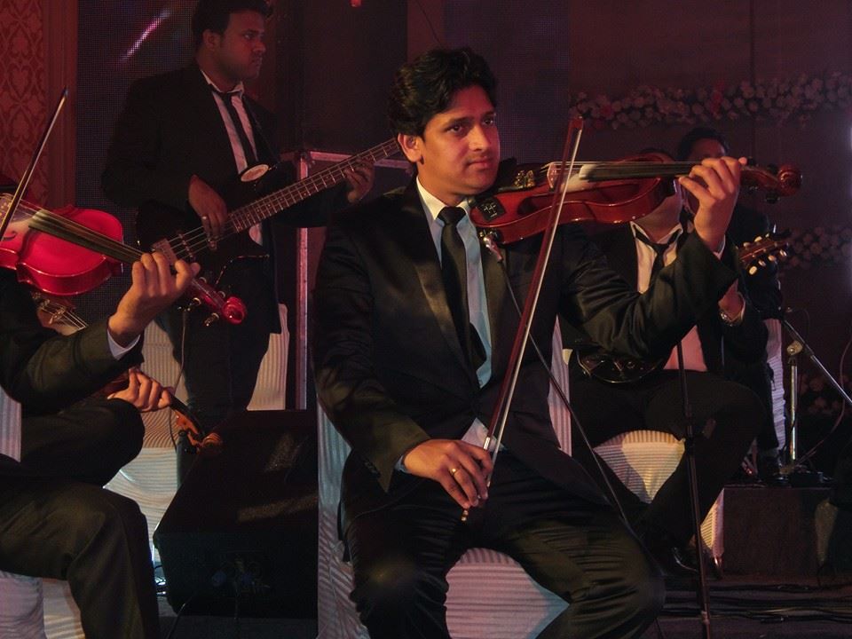 male violin players zarqa jordan